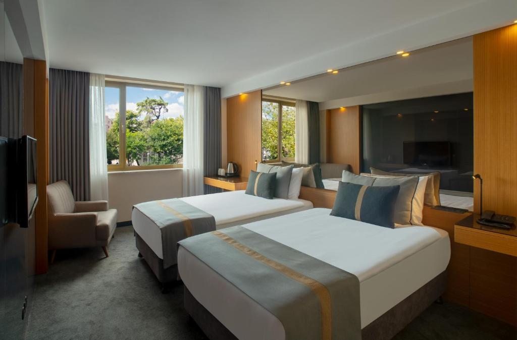 Двухместный (Улучшенный двухместный номер с 1 кроватью или 2 отдельными кроватями) отеля Tan, Стамбул