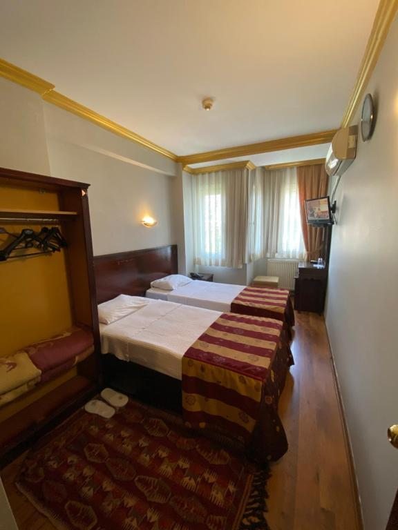 Двухместный (Двухместный номер с 2 отдельными кроватями и видом на море) отеля Abella Hotel, Стамбул