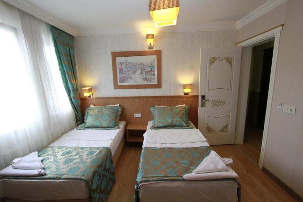 Двухместный (Двухместный номер с 1 кроватью или 2 отдельными кроватями) отеля Agora Boutique Hotel & Bistro, Стамбул