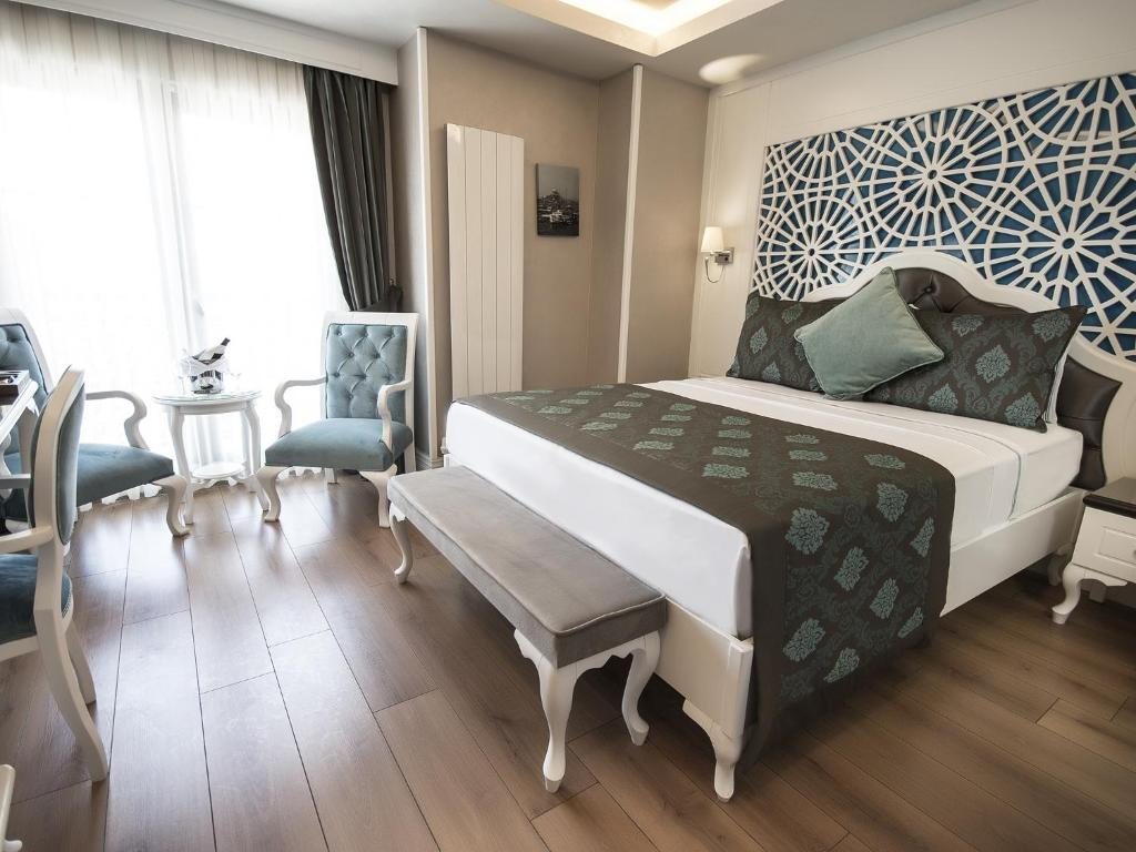 Двухместный (Улучшенный двухместный номер с 1 кроватью или 2 отдельными кроватями) отеля Antusa Palace Hotel & Spa, Стамбул