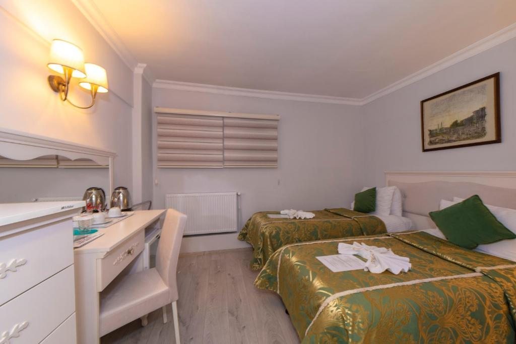 Двухместный (Двухместный номер эконом-класса с 1 кроватью или 2 отдельными кроватями на цокольном этаже) отеля Arena Hotel - Special Class, Стамбул