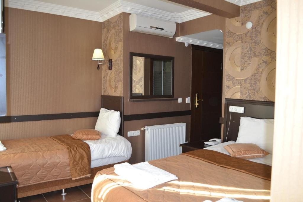 Трехместный (Стандартный трехместный номер) отеля Ares Hotel, Стамбул