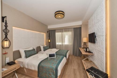 Трехместный (Стандартный трехместный номер) отеля Aybar Hotel, Стамбул