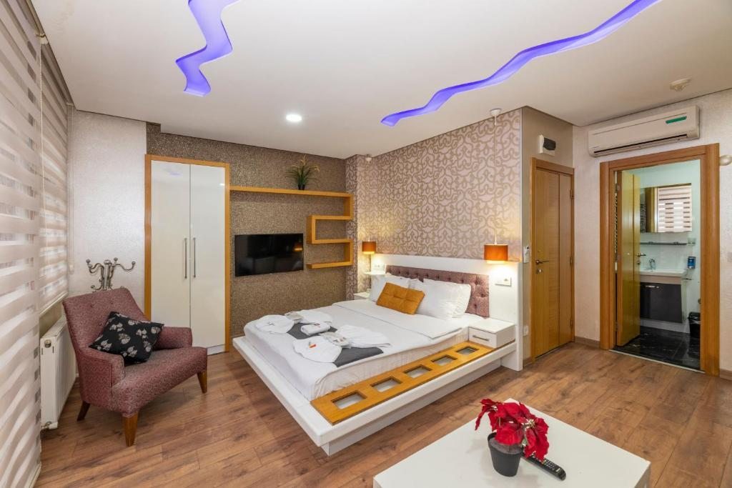 Сьюит (Люкс с кроватью размера «king-size») апарт-отеля Butterfly Suites, Стамбул