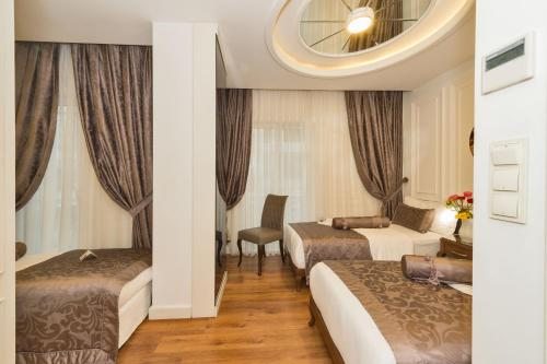 Трехместный (Двухместный номер с 2 отдельными кроватями и дополнительной кроватью) отеля Darkmen Hotel 2, Стамбул