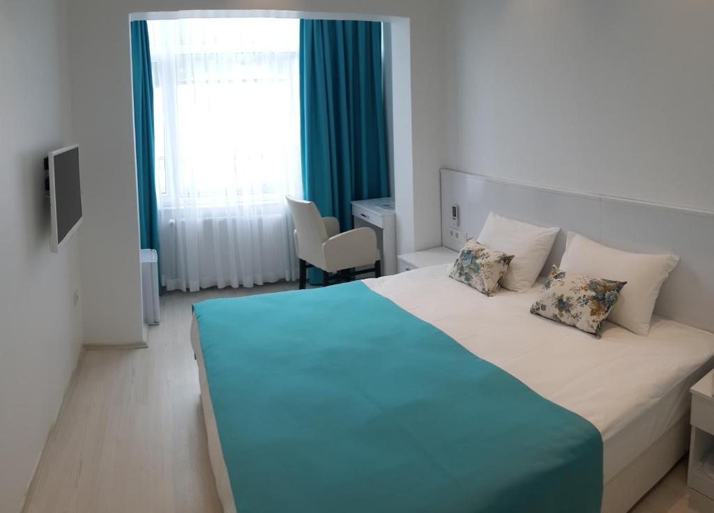 Двухместный (Двухместный номер Делюкс с 1 кроватью или 2 отдельными кроватями) отеля DND Hotel (Nif Hotel), Стамбул