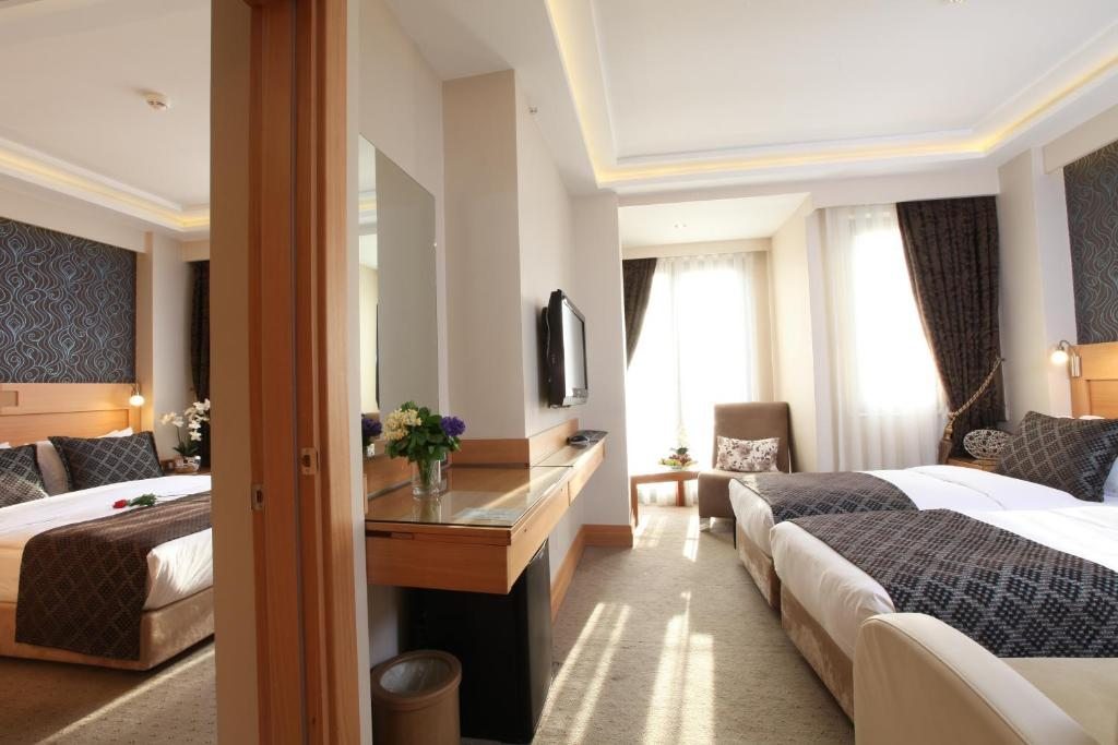 Четырехместный (Два смежных двухместных номера с 1 кроватью или 2 отдельными кроватями) отеля Emerald Hotel, Стамбул
