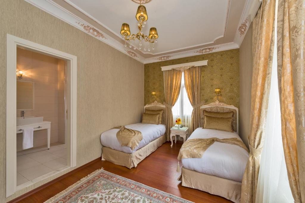 Двухместный (Двухместный номер Делюкс с 1 кроватью или 2 отдельными кроватями) отеля Enderun Hotel Istanbul, Стамбул