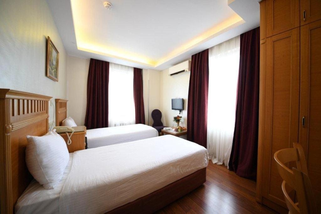Двухместный (Стандартный двухместный номер с 2 отдельными кроватями) отеля Express Star Hotel Taksim, Стамбул
