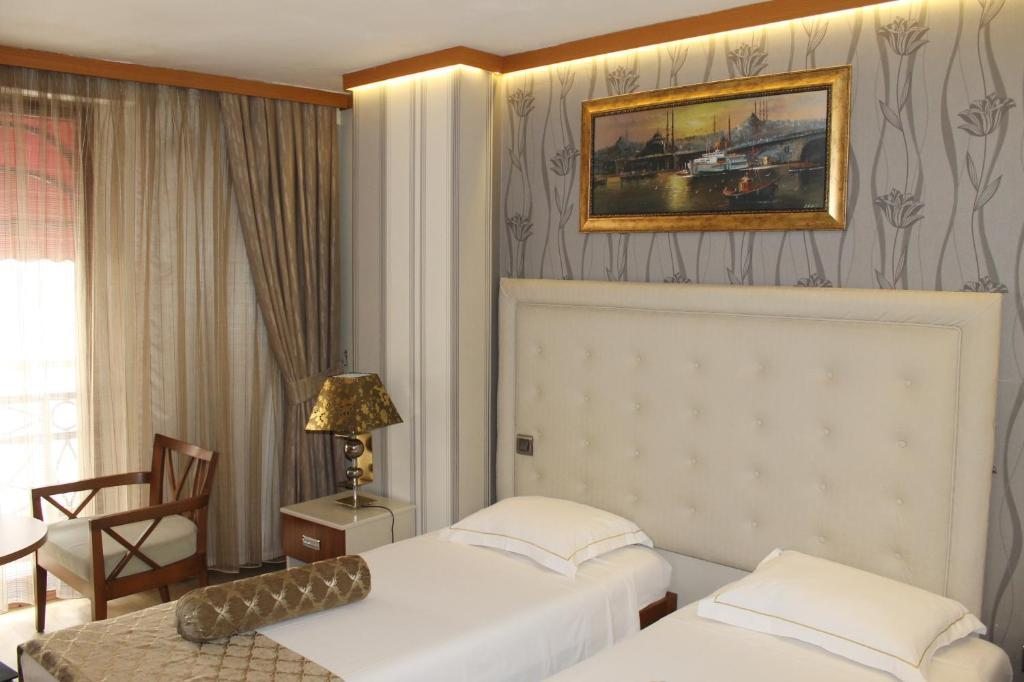 Двухместный (Стандартный номер с 2 односпальными кроватями) отеля Galata Palace Hotel, Стамбул