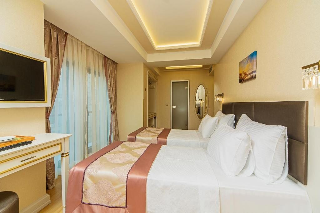 Двухместный (Стандартный двухместный номер с 1 кроватью или 2 отдельными кроватями) отеля Grand Naki Hotel, Стамбул