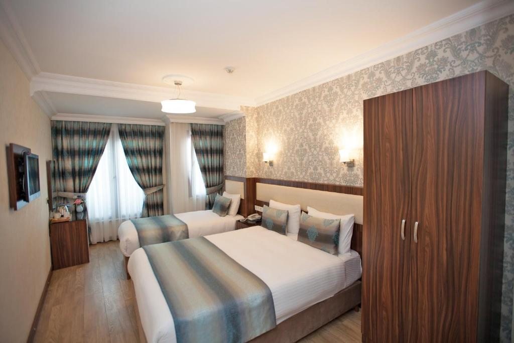 Двухместный (Улучшенный двухместный номер с 2 отдельными кроватями) отеля Hotel Bulvar Istanbul, Стамбул