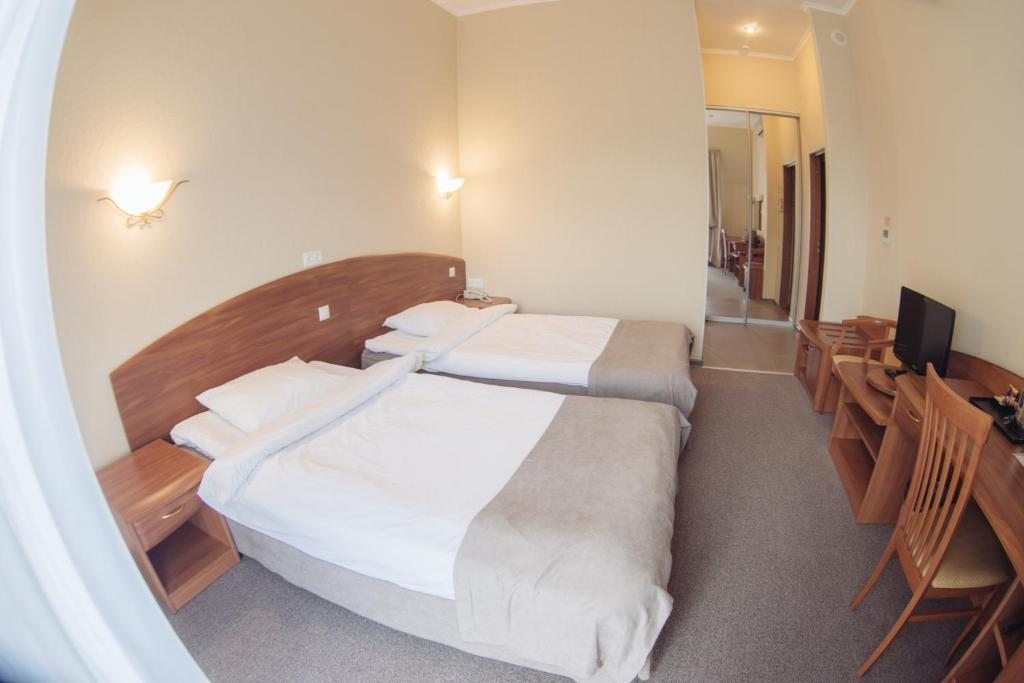 Двухместный (Стандартный двухместный номер с 1 кроватью или 2 отдельными кроватями) отеля Ампаро, Череповец