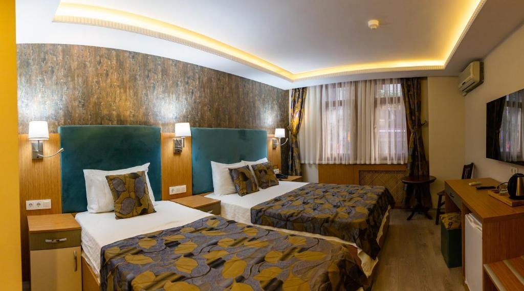 Трехместный (Стандартный трехместный номер) отеля Hotel Devman, Стамбул