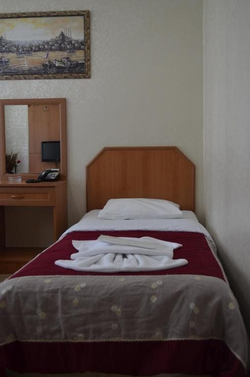 Одноместный (Бюджетный одноместный номер с общей ванной комнатой) отеля Hotel Ekol, Стамбул