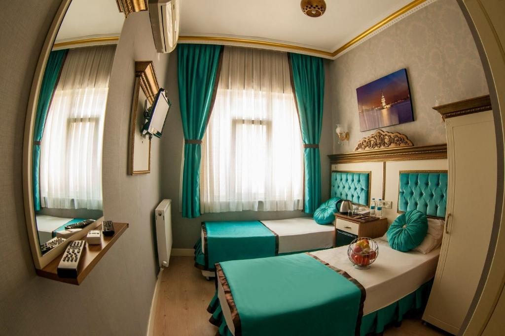 Двухместный (Двухместный номер с 2 отдельными кроватями) отеля Hurriyet Hotel, Стамбул