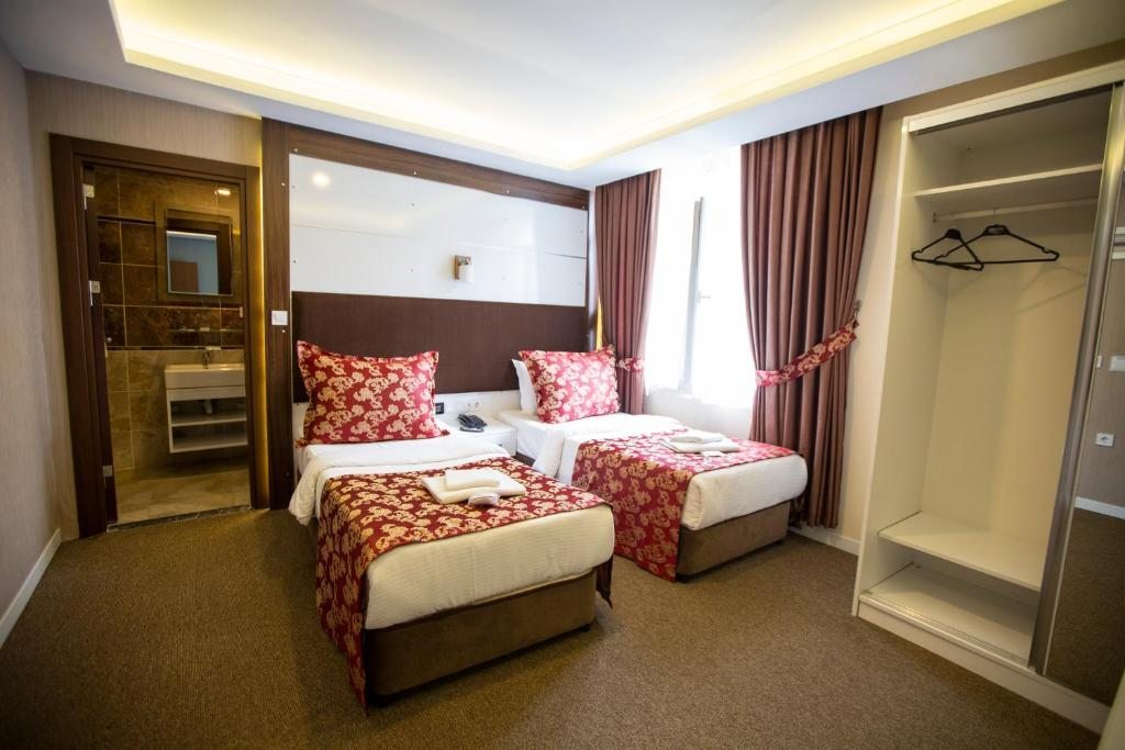 Двухместный (Стандартный двухместный номер с 2 отдельными кроватями) отеля Royal Life Exclusive, Трабзон