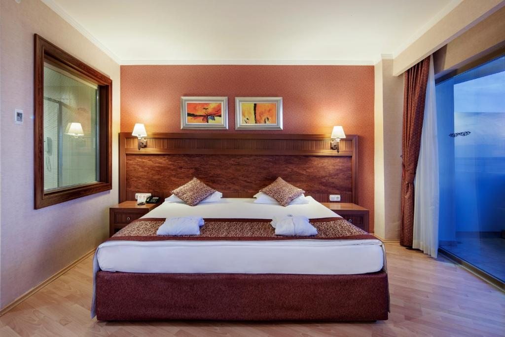 Двухместный (Стандартный двухместный номер с 1 кроватью или 2 отдельными кроватями и видом на сад) курортного отеля Alba Royal Hotel - Adults Only (+16), Сиде