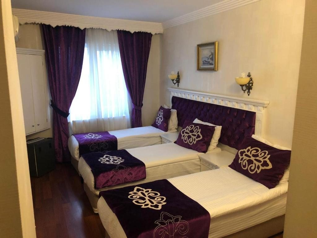 Трехместный (Трехместный номер) отеля Istanbul Holiday Hotel, Стамбул