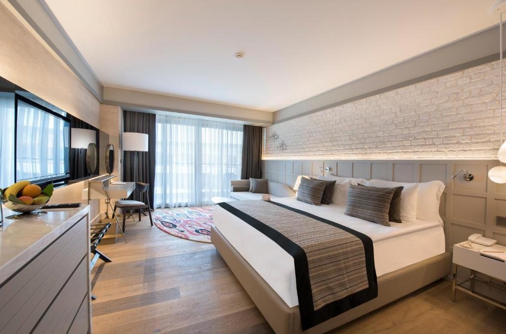 Двухместный (Улучшенный номер с боковым видом на море) курортного отеля Barut Acanthus & Cennet, Сиде