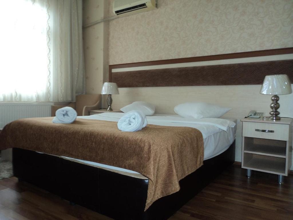 Двухместный (Двухместный номер с 1 кроватью или 2 отдельными кроватями) отеля Kalfa Hotel, Трабзон