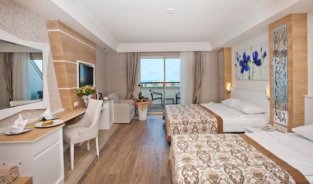 Двухместный (Стандартный двухместный номер с 1 кроватью или 2 отдельными кроватями, вид на море) курортного отеля Crystal Sunset Luxury Resort & Spa, Сиде