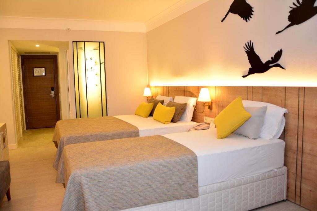 Двухместный (Двухместный номер с 1 кроватью или 2 отдельными кроватями и боковым видом на море) курортного отеля Nova, Сиде