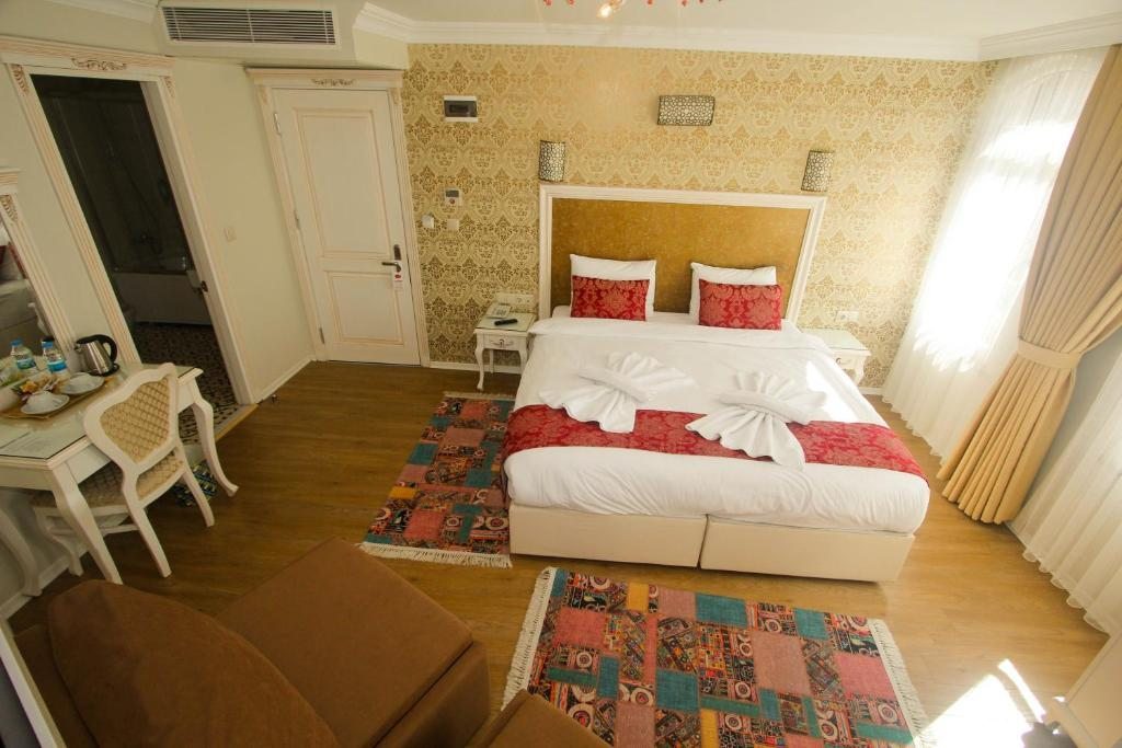 Двухместный (Двухместный номер Делюкс с 1 кроватью или 2 отдельными кроватями) отеля Ozhan Istanbul, Стамбул