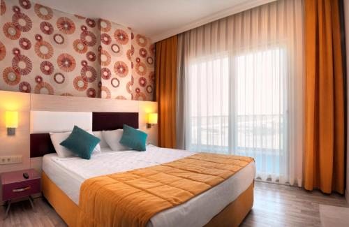 Двухместный (Стандартный двухместный номер с 1 кроватью или 2 отдельными кроватями и проживанием по системе «все включено») отеля Ramada Resort Side, Сиде