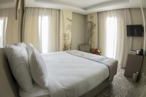 Двухместный (Двухместный номер с 1 кроватью и балконом) отеля Peyk Hotel, Стамбул