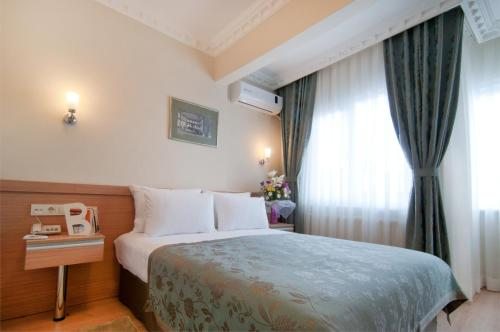 Апартаменты (Апартаменты с 2 спальнями - Дополнительное здание) апарт-отеля Q Hotel Istanbul, Стамбул