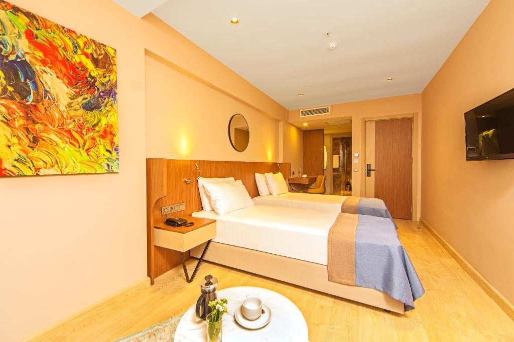 Двухместный (Двухместный номер Делюкс с 1 кроватью или 2 отдельными кроватями) отеля Redmont Hotel Nisantasi, Стамбул