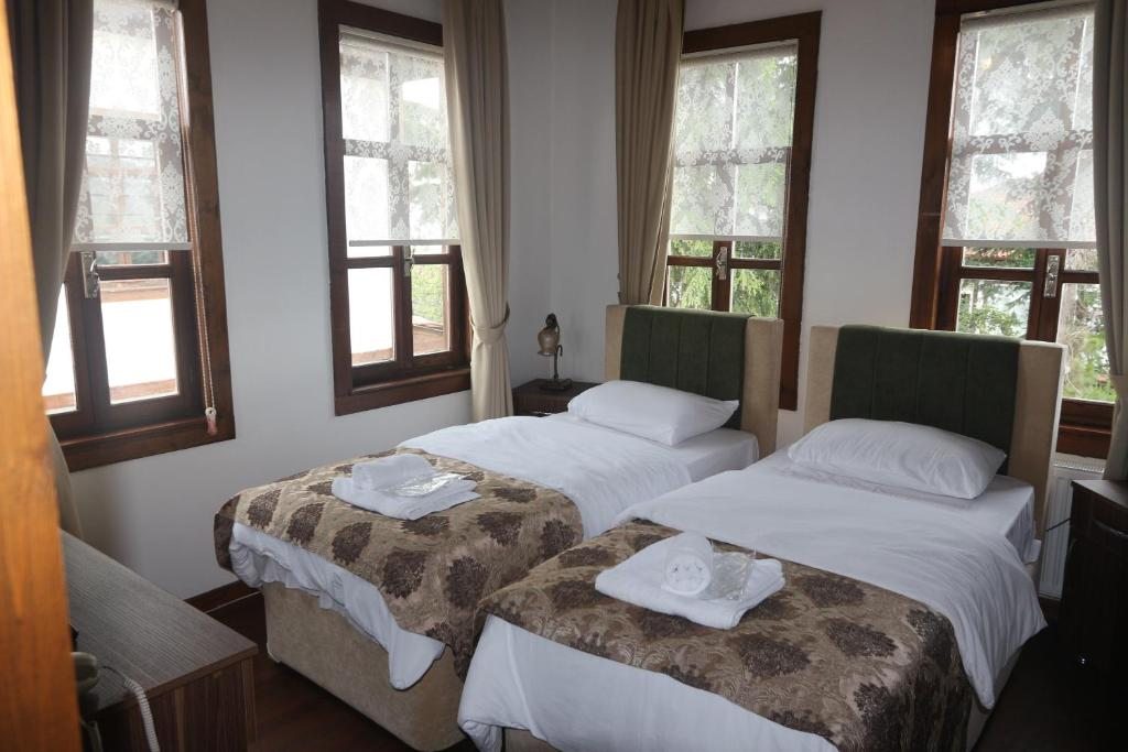 Двухместный (Двухместный номер с 1 кроватью или 2 отдельными кроватями и видом на море) отеля Mehmet Efendi Konagi Otel Restorant Cafe, Трабзон
