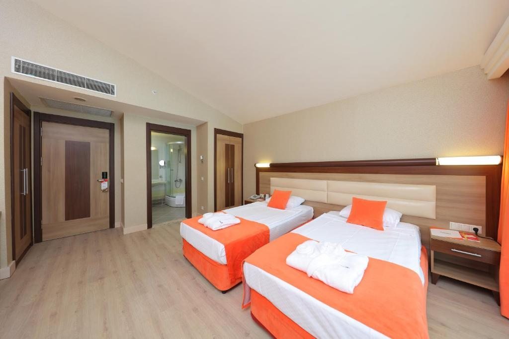 Двухместный (Стандартный двухместный номер с 2 отдельными кроватями) курортного отеля Sueno Hotels Beach Side, Сиде