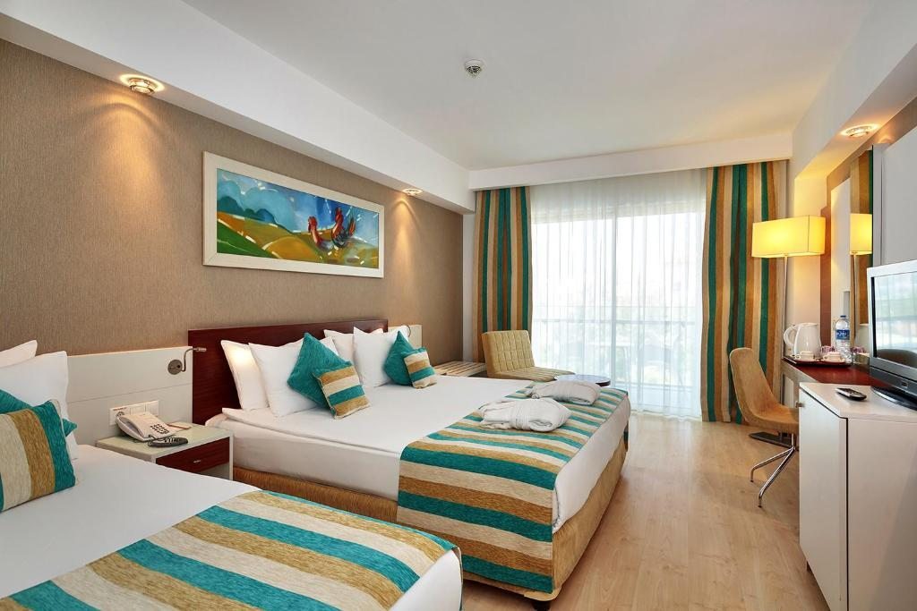 Трехместный (Стандартный двухместный номер с 1 кроватью - Частичный вид на море) отеля Sunis Evren Beach, Сиде