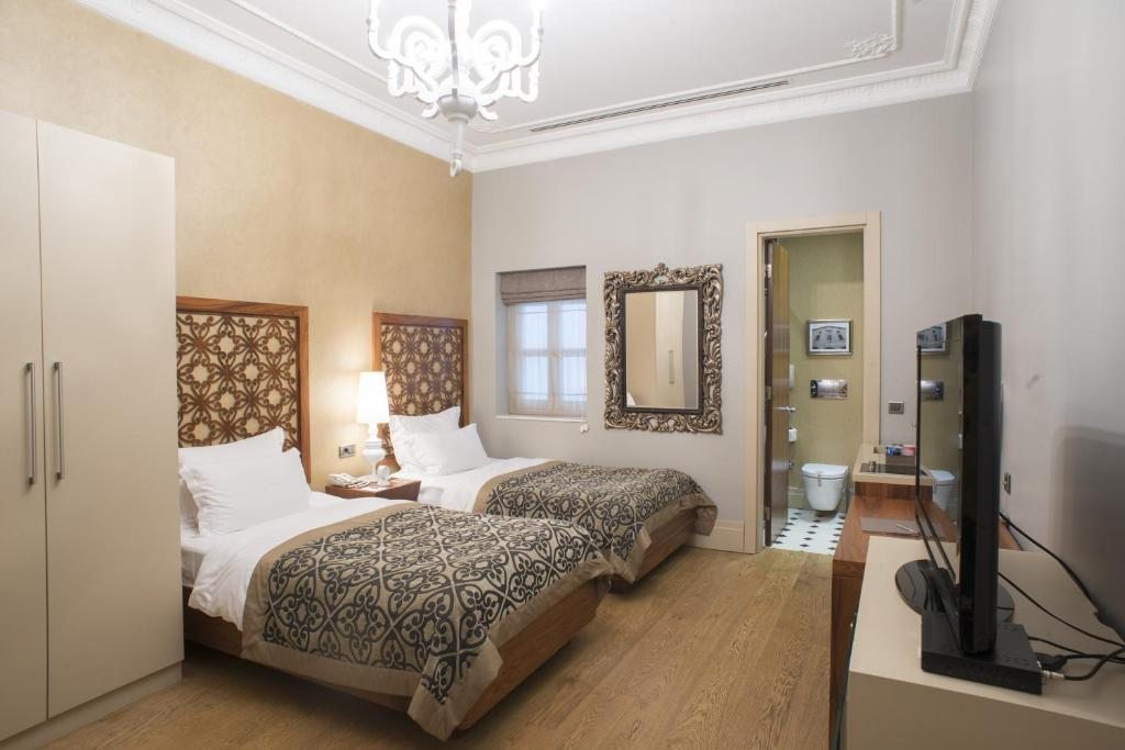 Апартаменты (Улучшенный двухместный номер с 2 отдельными кроватями) отеля Stories Hotel Kumbaracı, Стамбул