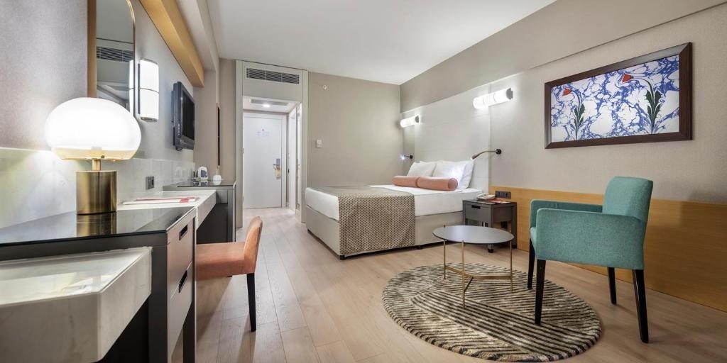 Двухместный (Стандартный двухместный номер с 1 кроватью или 2 отдельными кроватями и боковым видом на море) курортного отеля Trendy Aspendos Beach, Сиде
