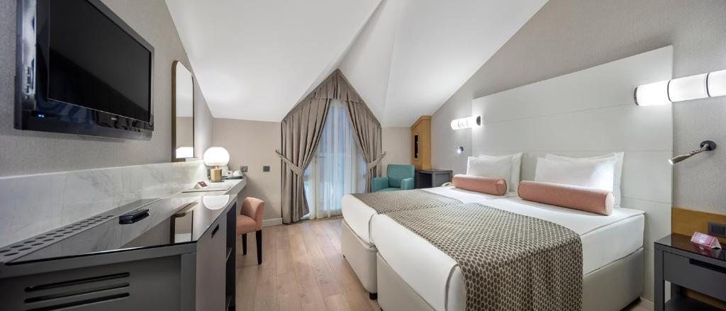 Двухместный (Двухместный номер эконом-класса с 1 кроватью или 2 отдельными кроватями) курортного отеля Trendy Aspendos Beach, Сиде