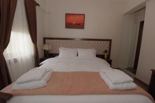 Двухместный (Двухместный номер Делюкс с 1 кроватью + дополнительная кровать) гостевого дома Zagnospasa Konaklari, Трабзон