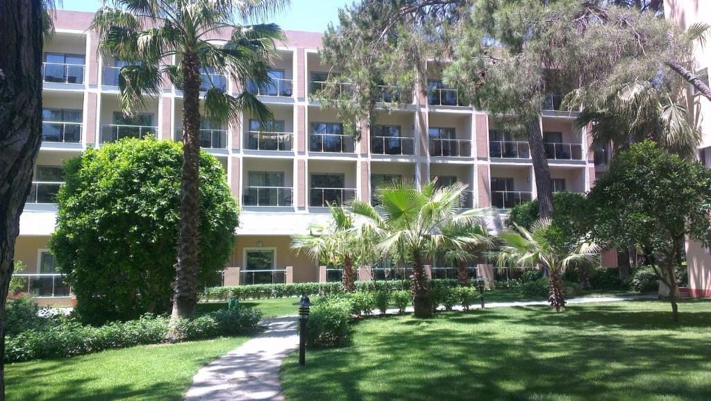 Трехместный (Трехместный номер Делюкс с видом на сад) курортного отеля Turquoise, Сиде
