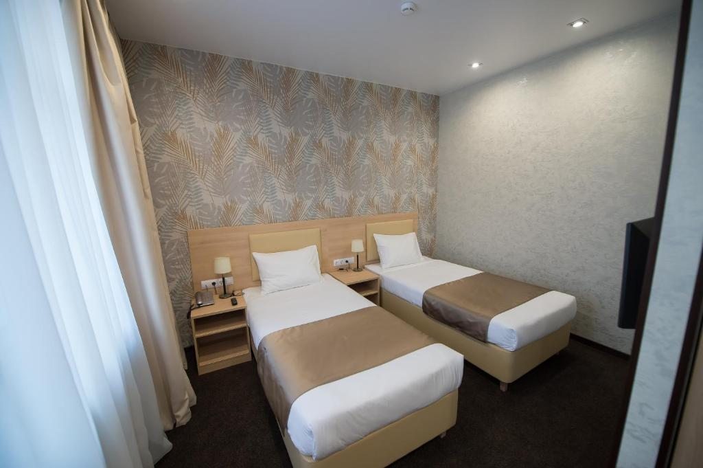 Двухместный (Двухместный номер с 2 отдельными кроватями) отеля Сильвер Хаус, Магадан