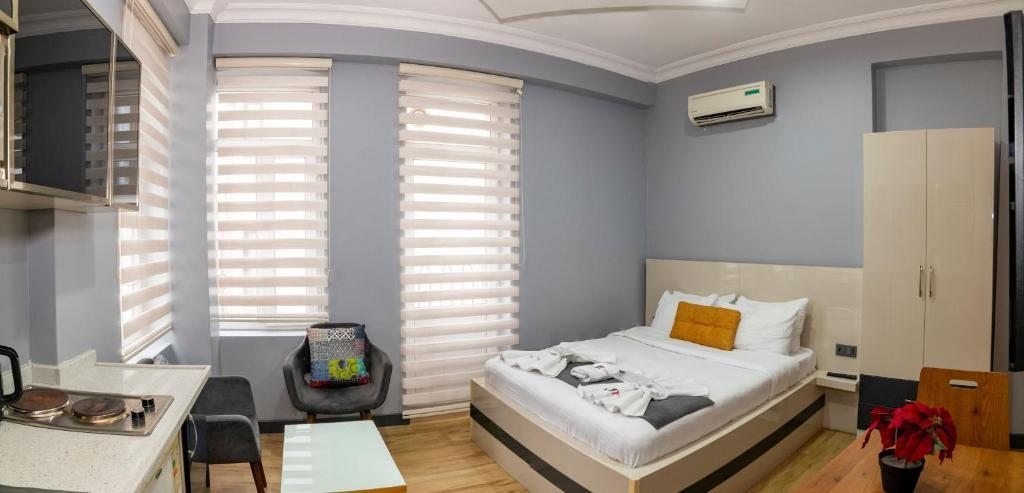Сьюит (Стандартный двухместный люкс с 1 кроватью) апарт-отеля Taxim Trend Suites, Стамбул