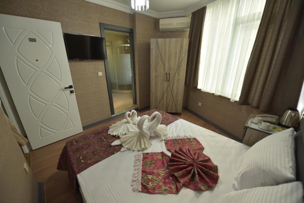 Двухместный (Стандартный двухместный номер с 1 кроватью или 2 отдельными кроватями) отеля The Luxx Hotel, Стамбул