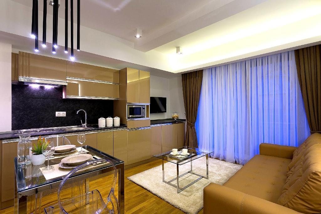 Семейный (Смежный семейный люкс) отеля The Place Suites by Cey, Стамбул