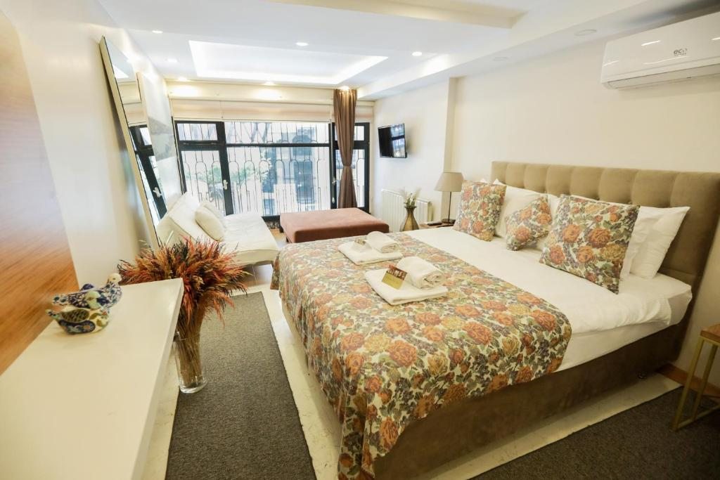 Двухместный (Улучшенный номер с кроватью размера «king-size») отеля Wame Suite Hotel Nisantasi, Стамбул
