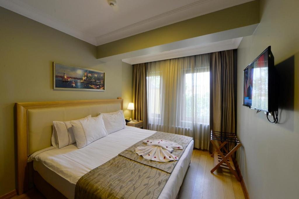 Двухместный (Двухместный номер с 1 кроватью или 2 отдельными кроватями) отеля Agora Life Hotel, Стамбул