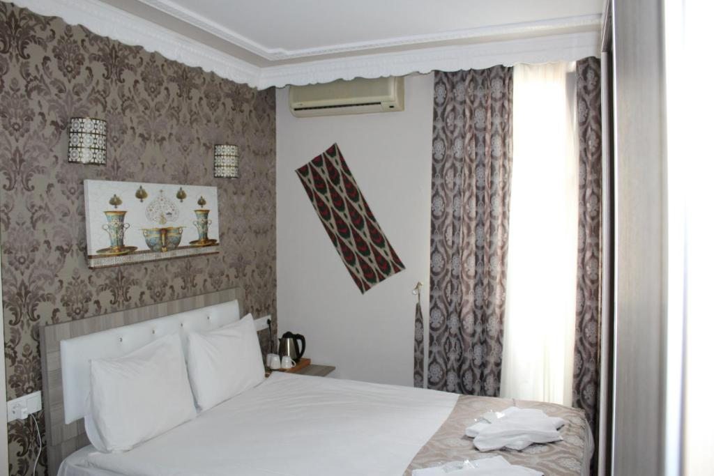 Трехместный (Трехместный номер «Комфорт» с душем) гостевого дома Ararat Hotel, Стамбул