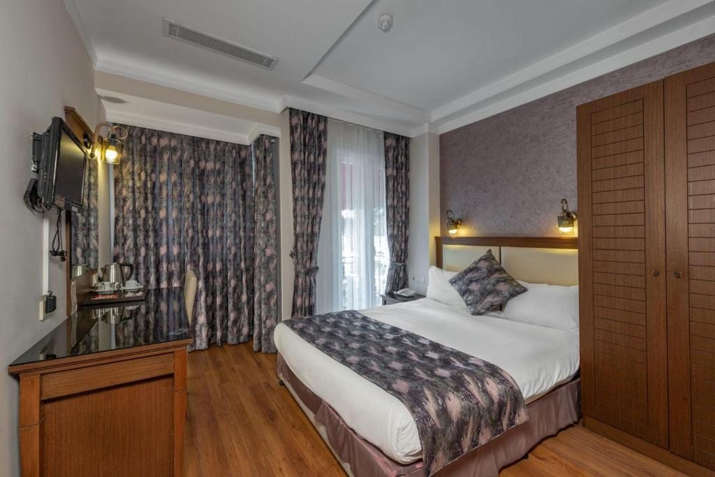 Двухместный (Двухместный номер с 1 кроватью или 2 отдельными кроватями) отеля Aristocrat Hotel, Стамбул