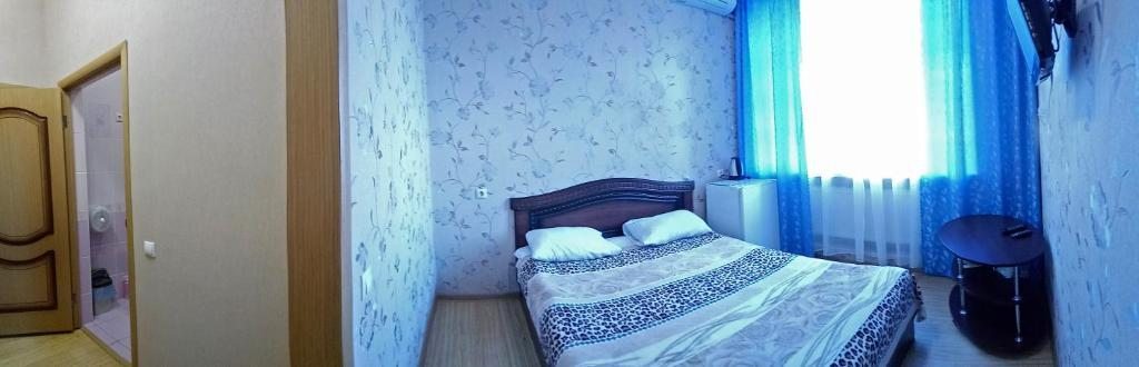 Двухместный (Двухместный номер с 1 кроватью и собственной ванной комнатой) парк-отеля Изумруд, Мостовской