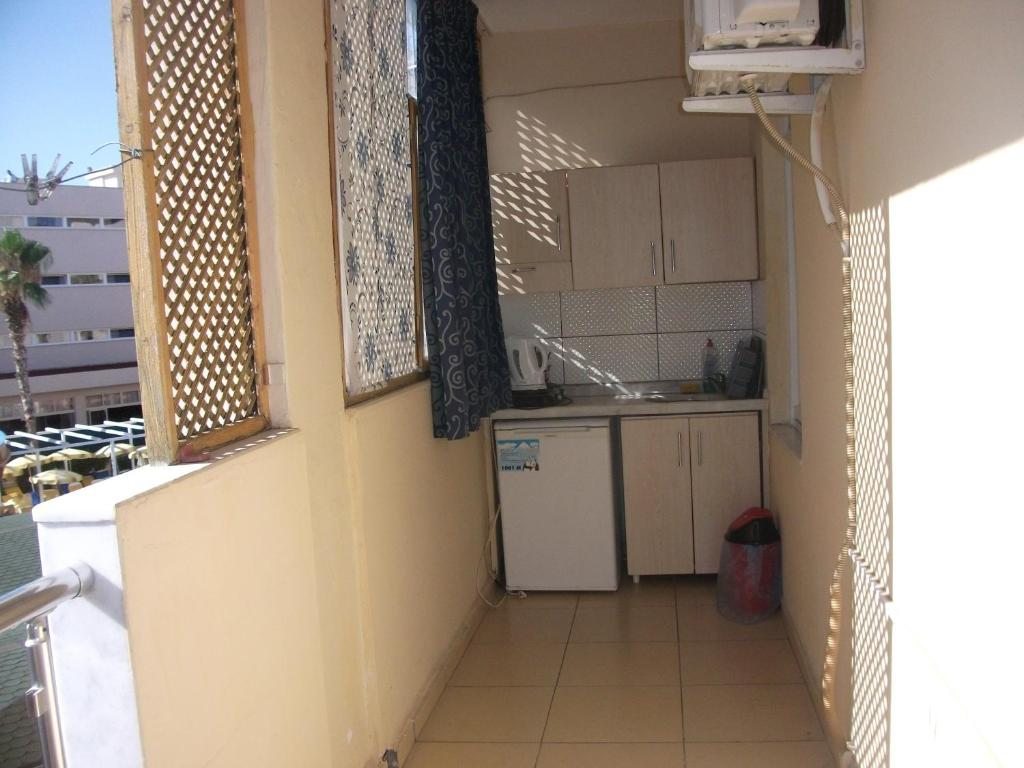Двухместный (Двухместный номер с 1 кроватью и мини-кухней) апарт-отеля Delphin Apart Hotel, Сиде